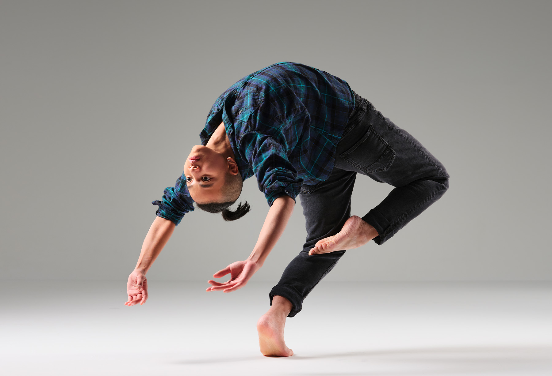 creative performance photography, male dancer bending backwards