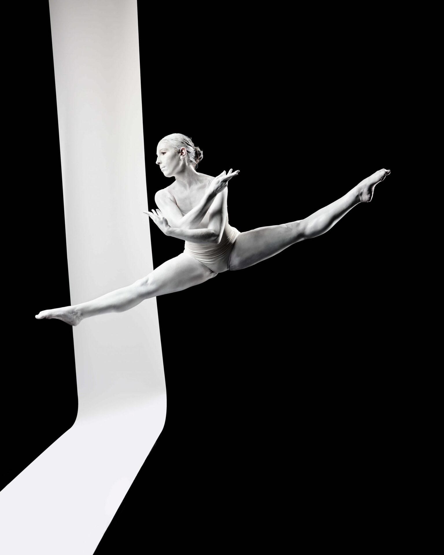 creative dance photographer, female dancer leaping 